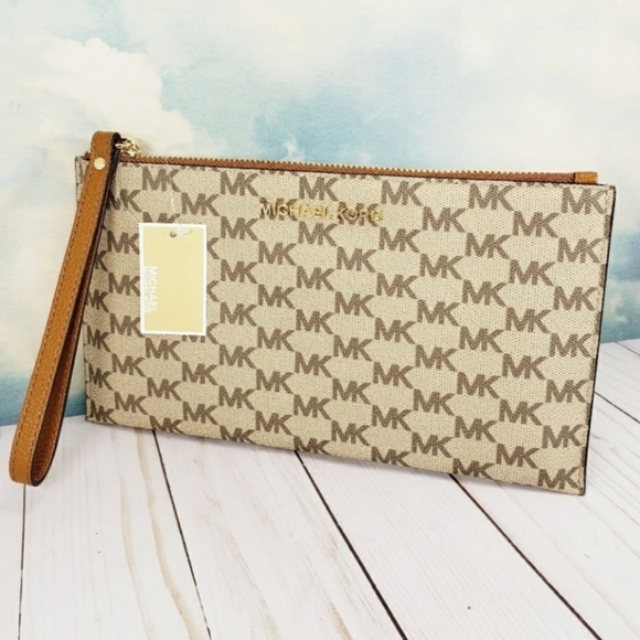 Michael Kors Handbags - Michael Kors Large Zip Clutch Wristlet